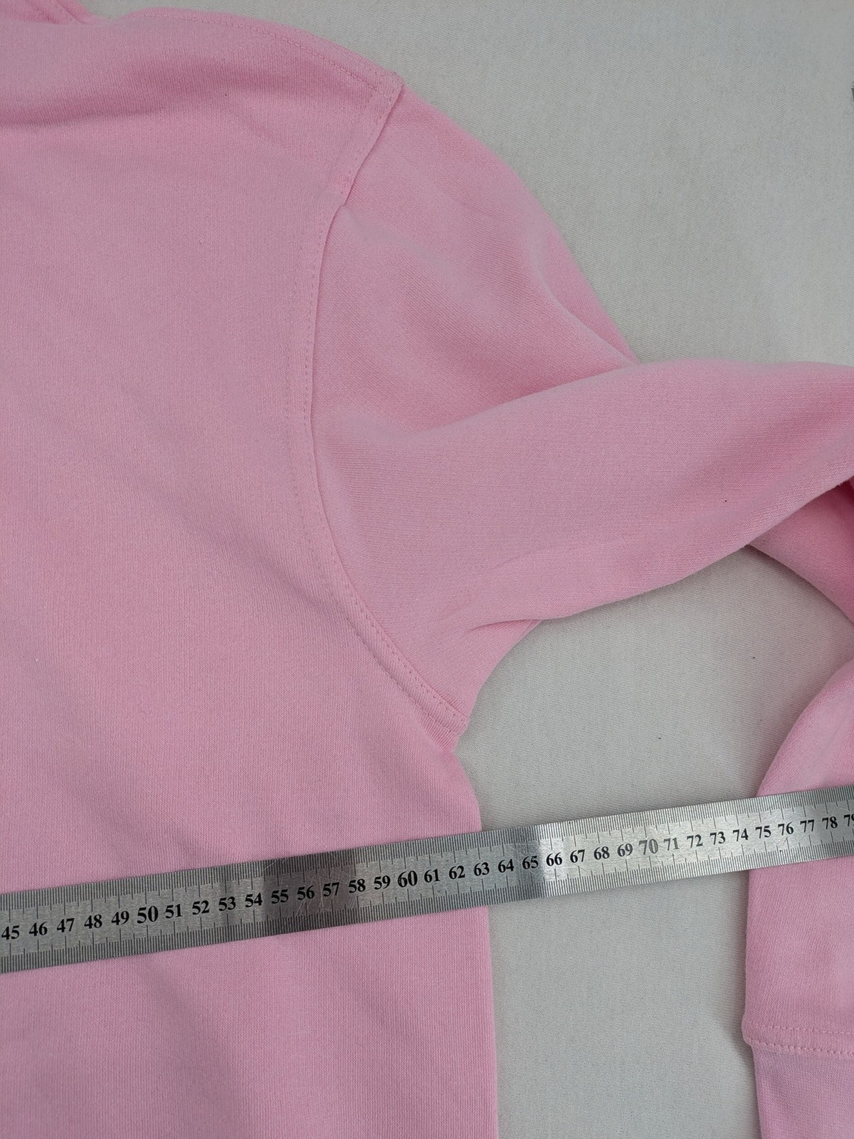 XXL pink hoodie featuring large Jigglypuff graphic print, soft cotton blend material.