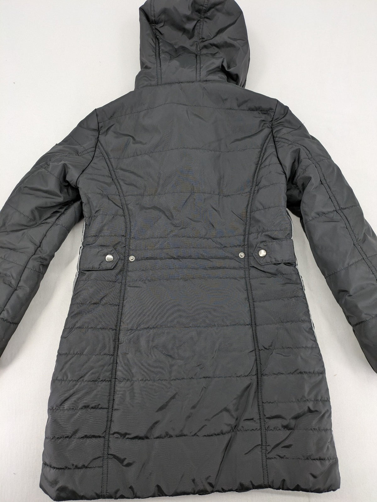 Vero Moda black quilted jacket with hood, reflective stripes, nylon material.