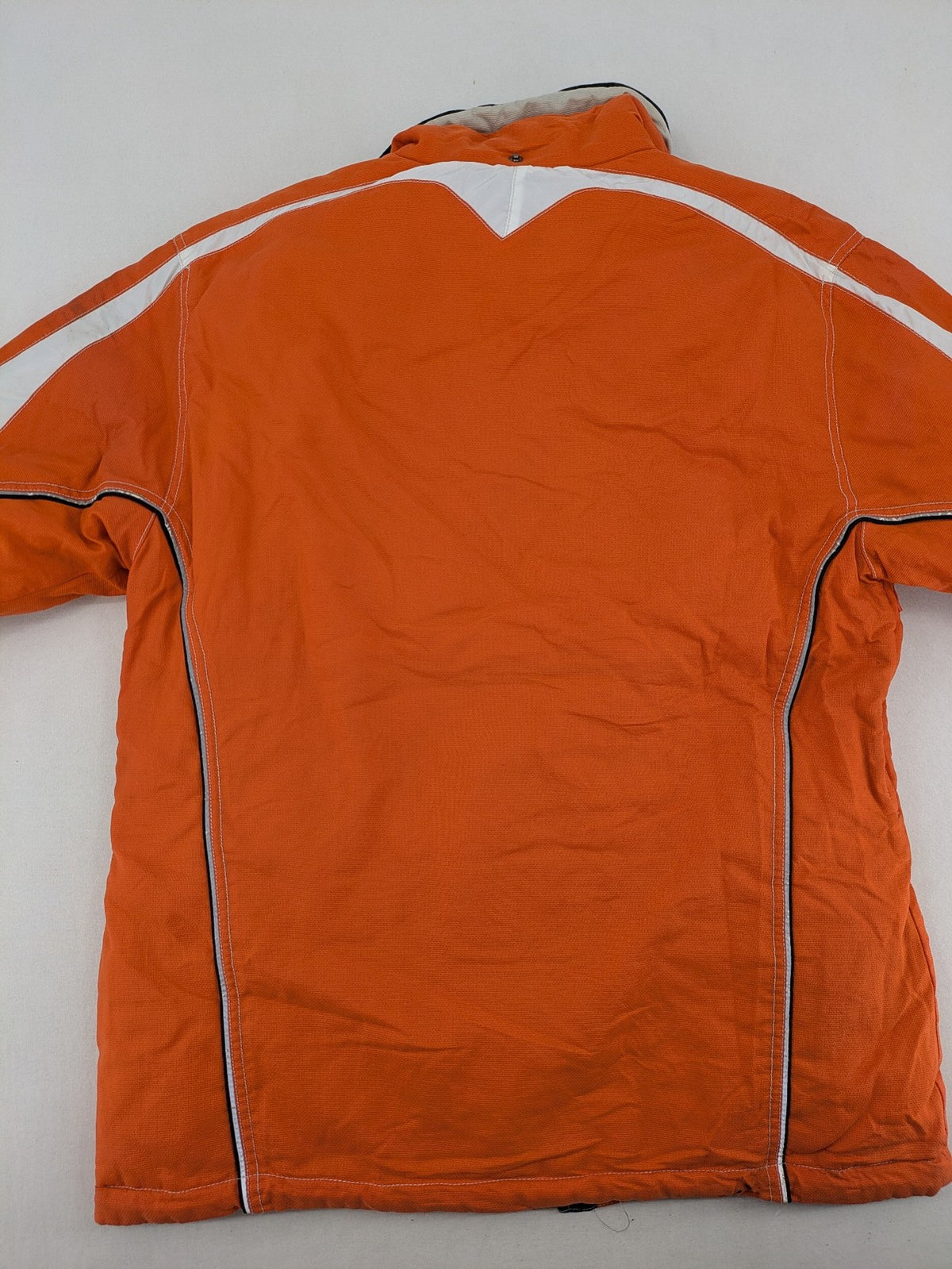 Outback orange outdoor jacket size 42 with reflective accents and mixed color details.