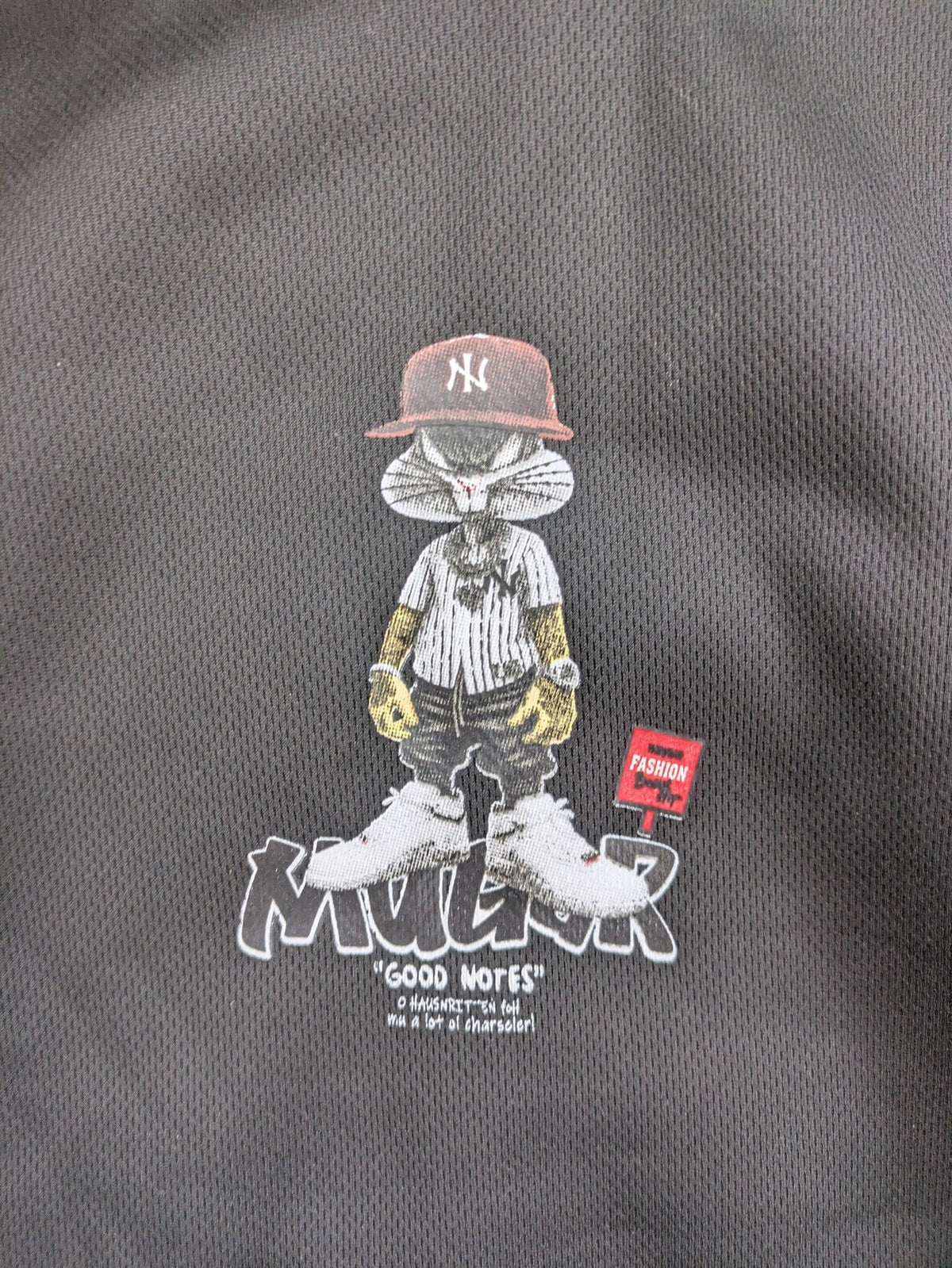 Kuima multi graphic hoodie black featuring large Bugs Bunny print and kangaroo pocket.
