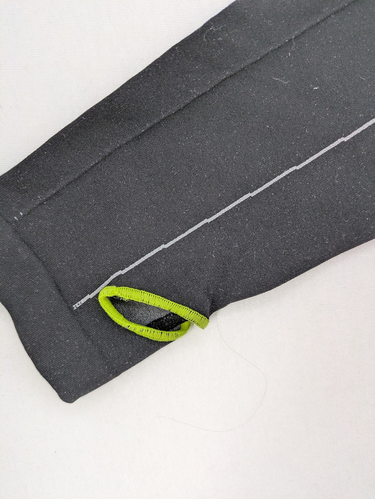 Iron-ic black long sleeve baselayer top with standing collar and thumbholes.