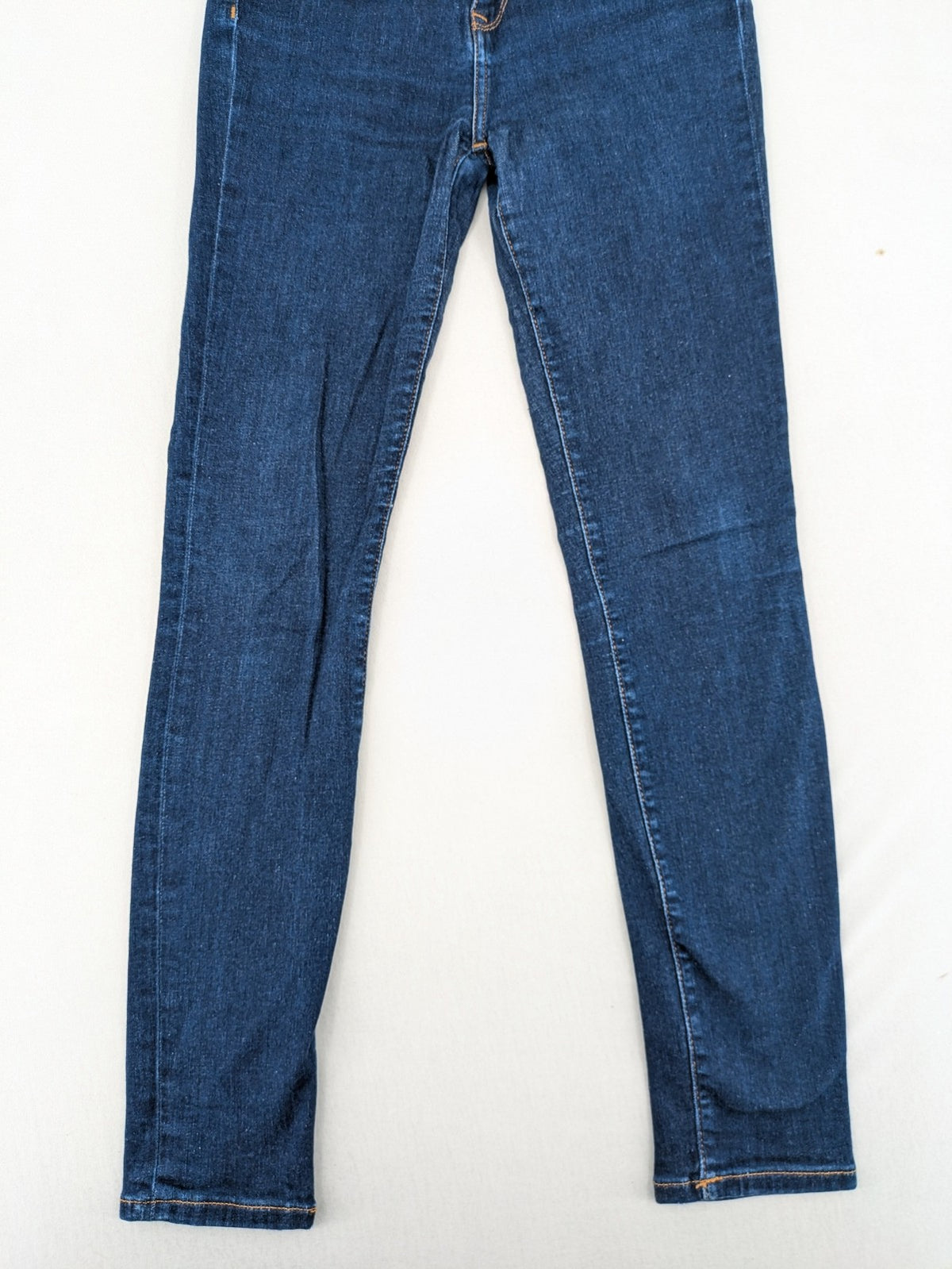 Tommy Hilfiger blue skinny jeans, five-pocket design, made from organic cotton blend.