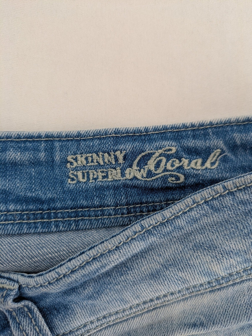 ONLY skinny jeans superlow coral orange pink distressed denim with modern used-look details.