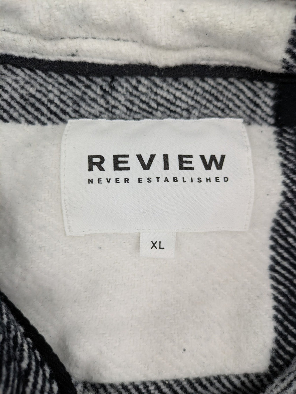 Review flannel jacket black white checkered pattern cotton material with chest pockets