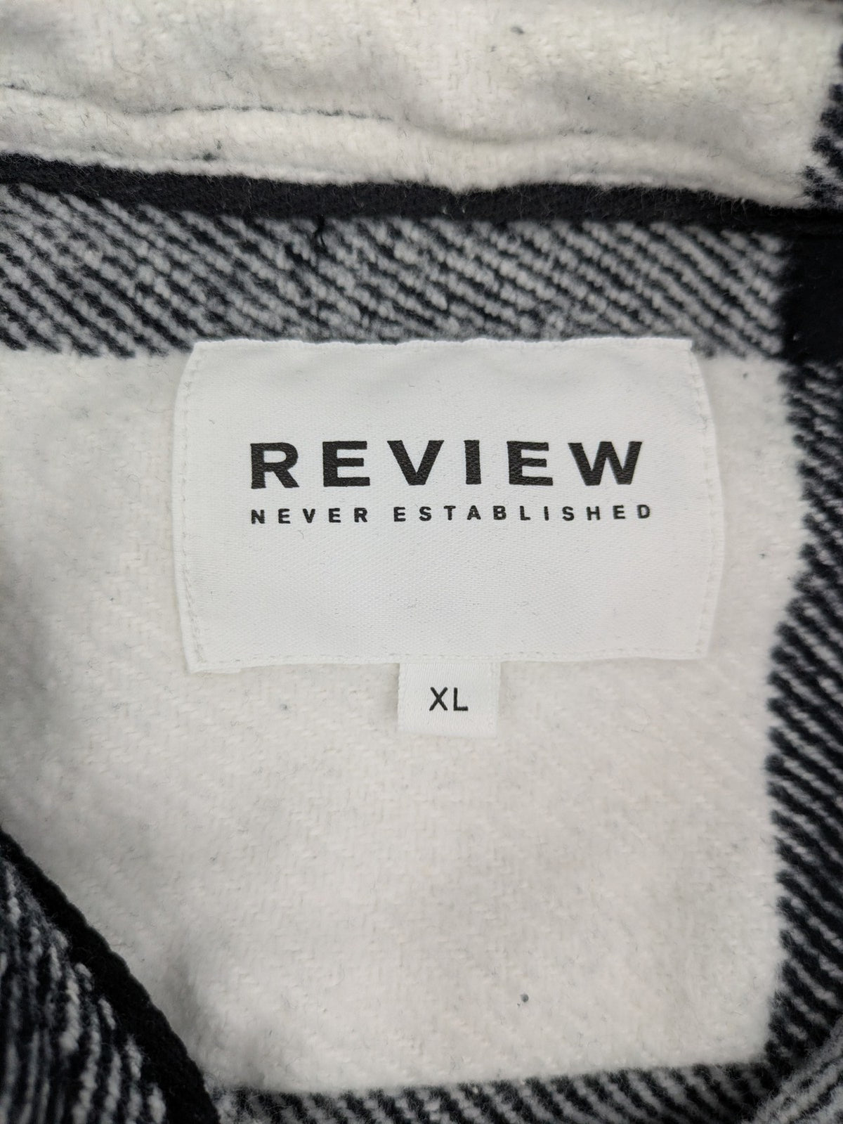 Review flannel jacket black white checkered pattern cotton material with chest pockets
