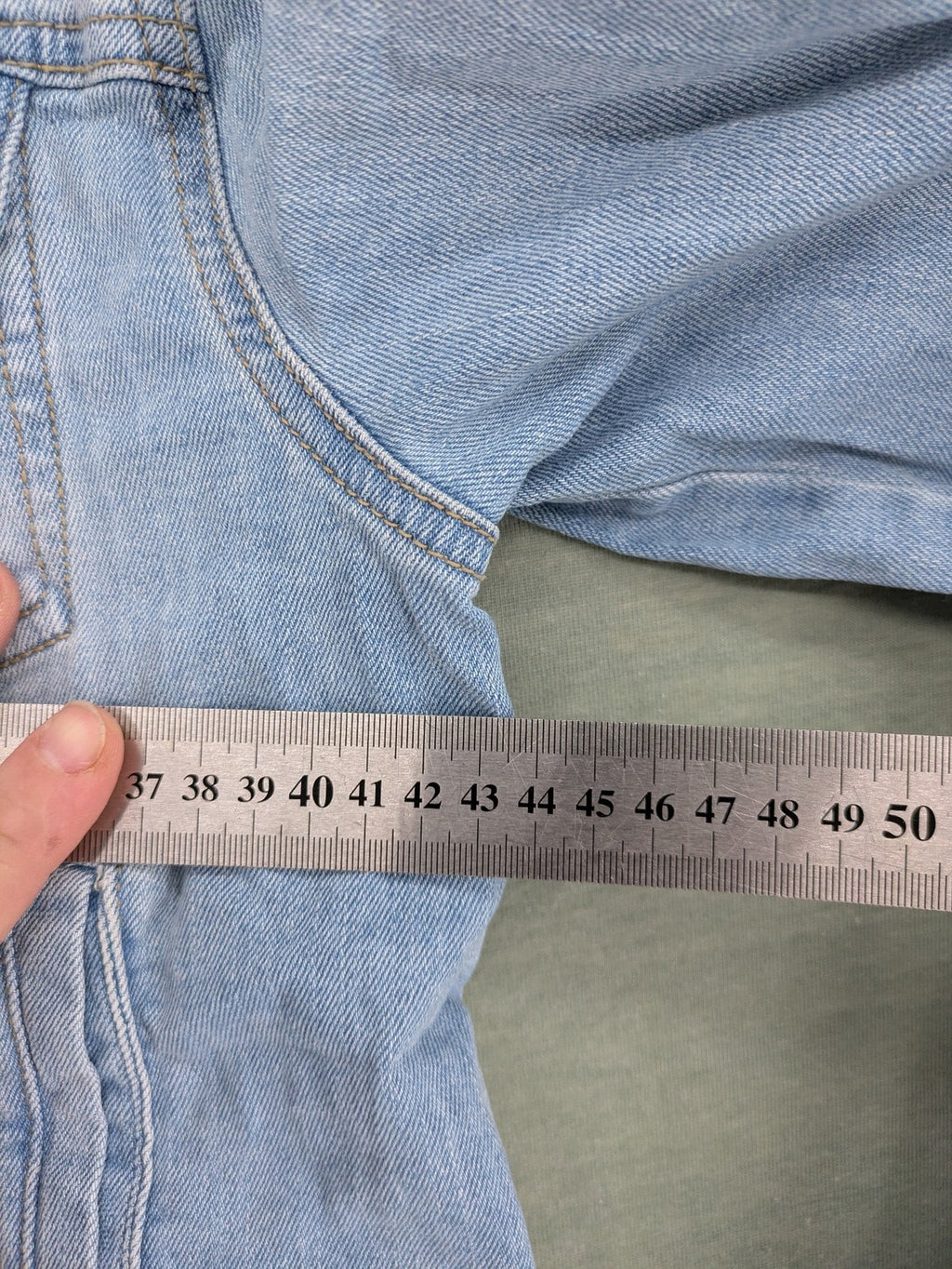 Pimkie blue denim jacket with classic cut, button placket, and two chest pockets.
