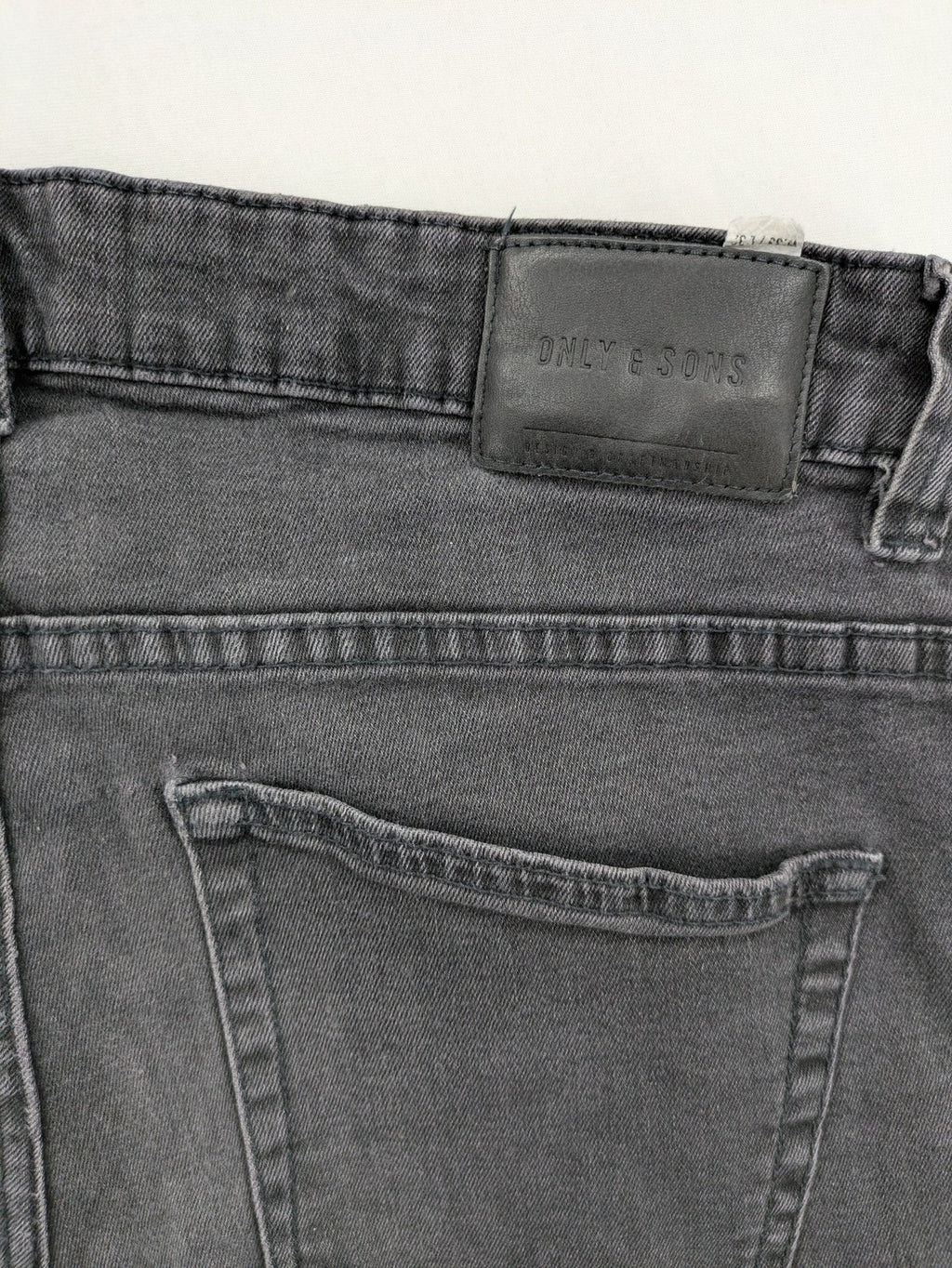 Only & Sons grey slim fit jeans with ripped details and open hem, stretch denim.