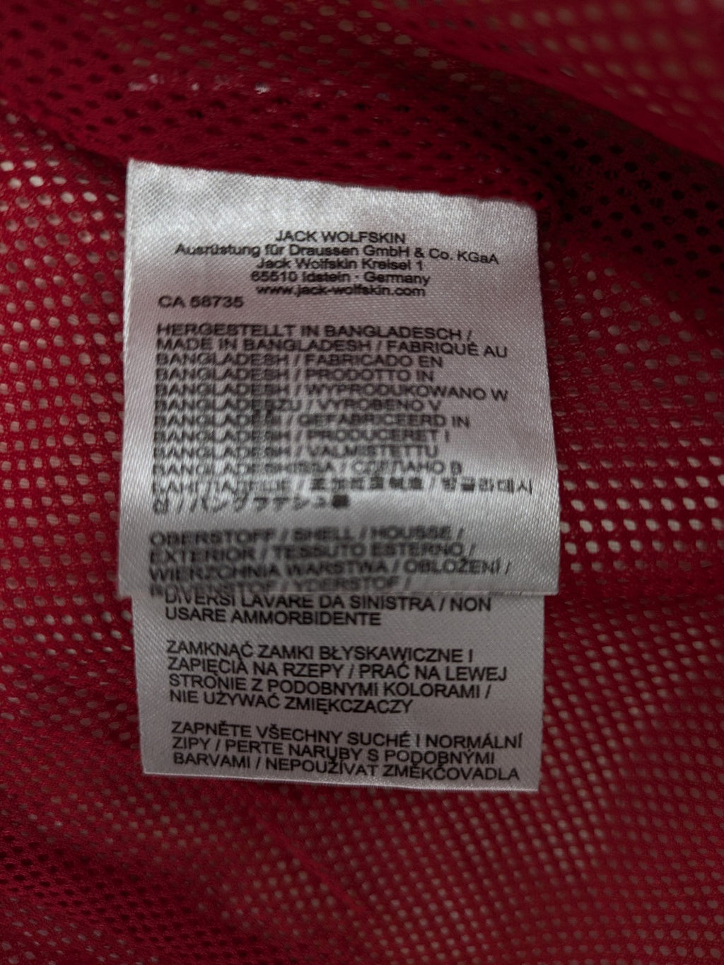 Jack Wolfskin red outdoor jacket with adjustable hood and Texapore waterproof technology