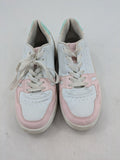 Graceland white sneakers with pink and mint green accents, low-top design, cushioned tongue.