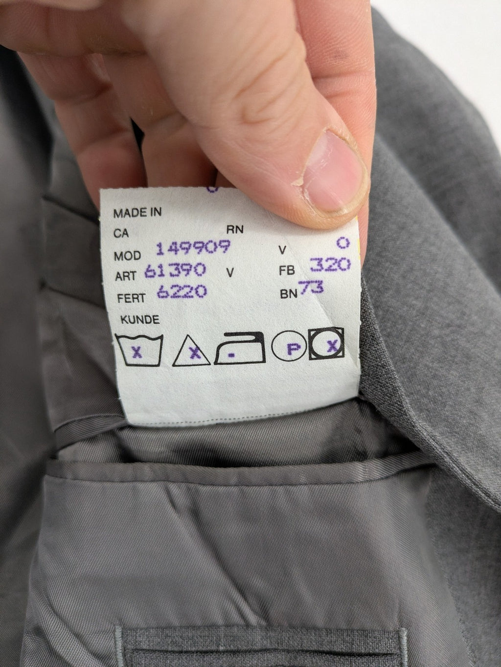 Montego grey blazer three-button design made from wool blend with smooth lining.
