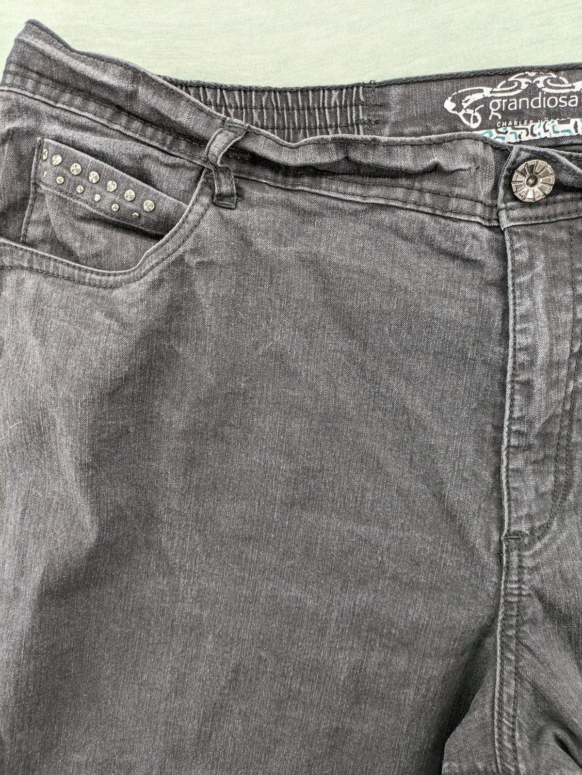 Charles Vögele grey straight jeans with elastic waistband and decorative studs on pockets.