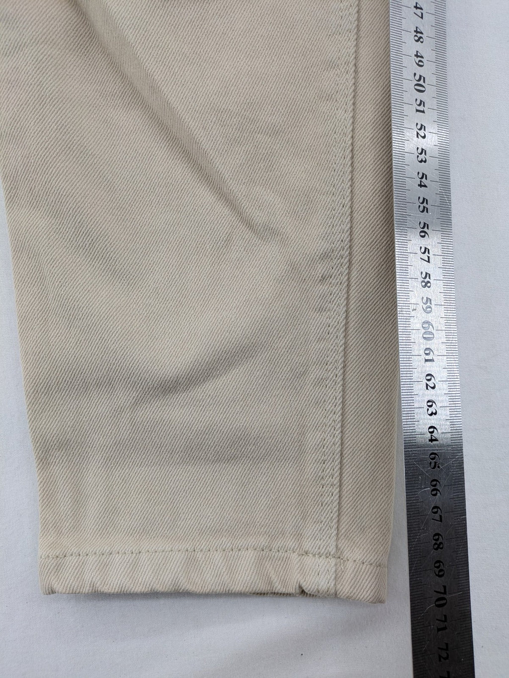 Pimkie beige mom jeans high waist tapered fit with front button placket and cotton material.