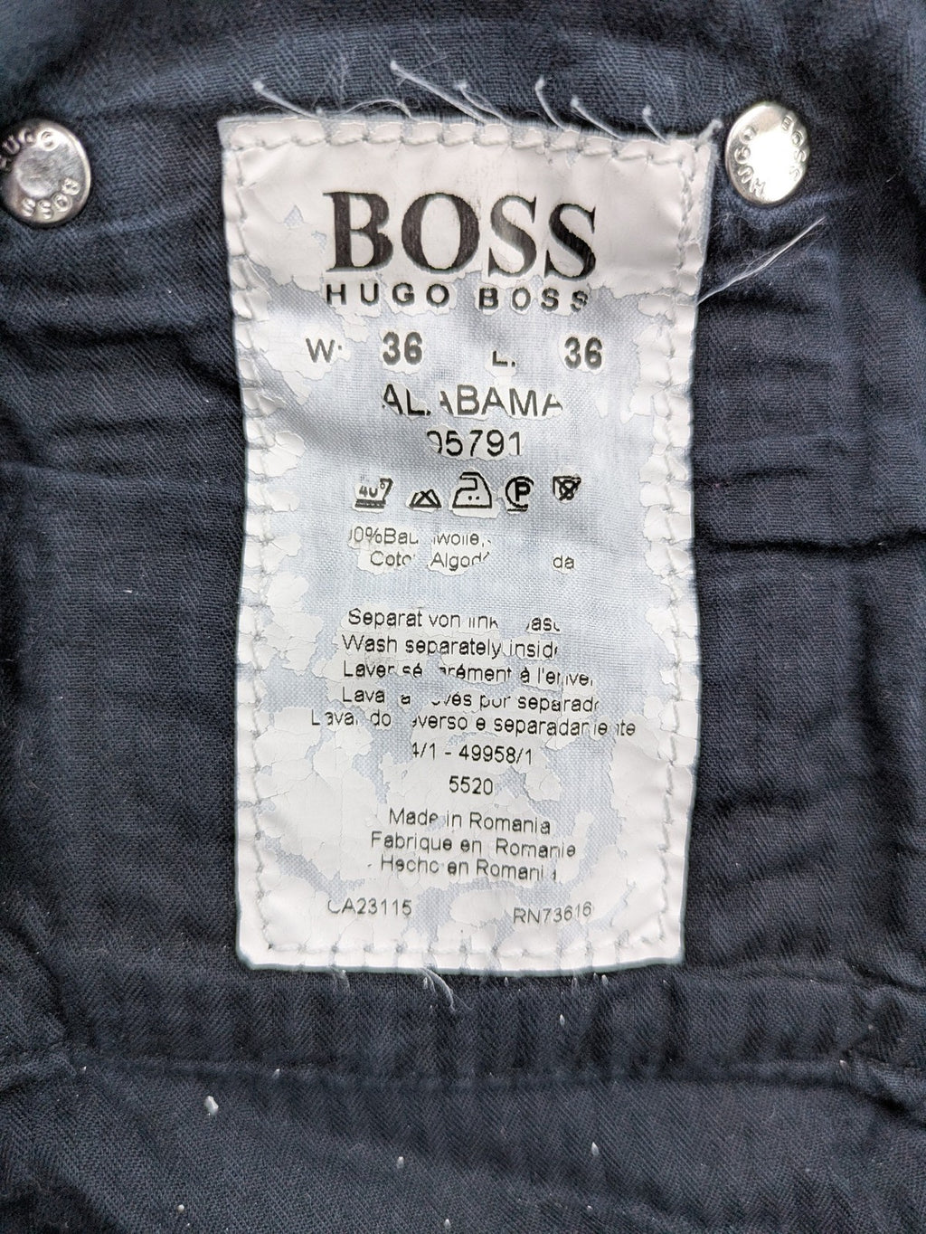 BOSS Hugo Boss grey straight jeans classic 5-pocket design with leather patch.
