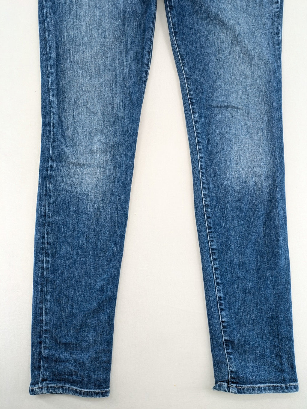 Mavi blue straight leg jeans with classic 5-pocket styling and medium wash.