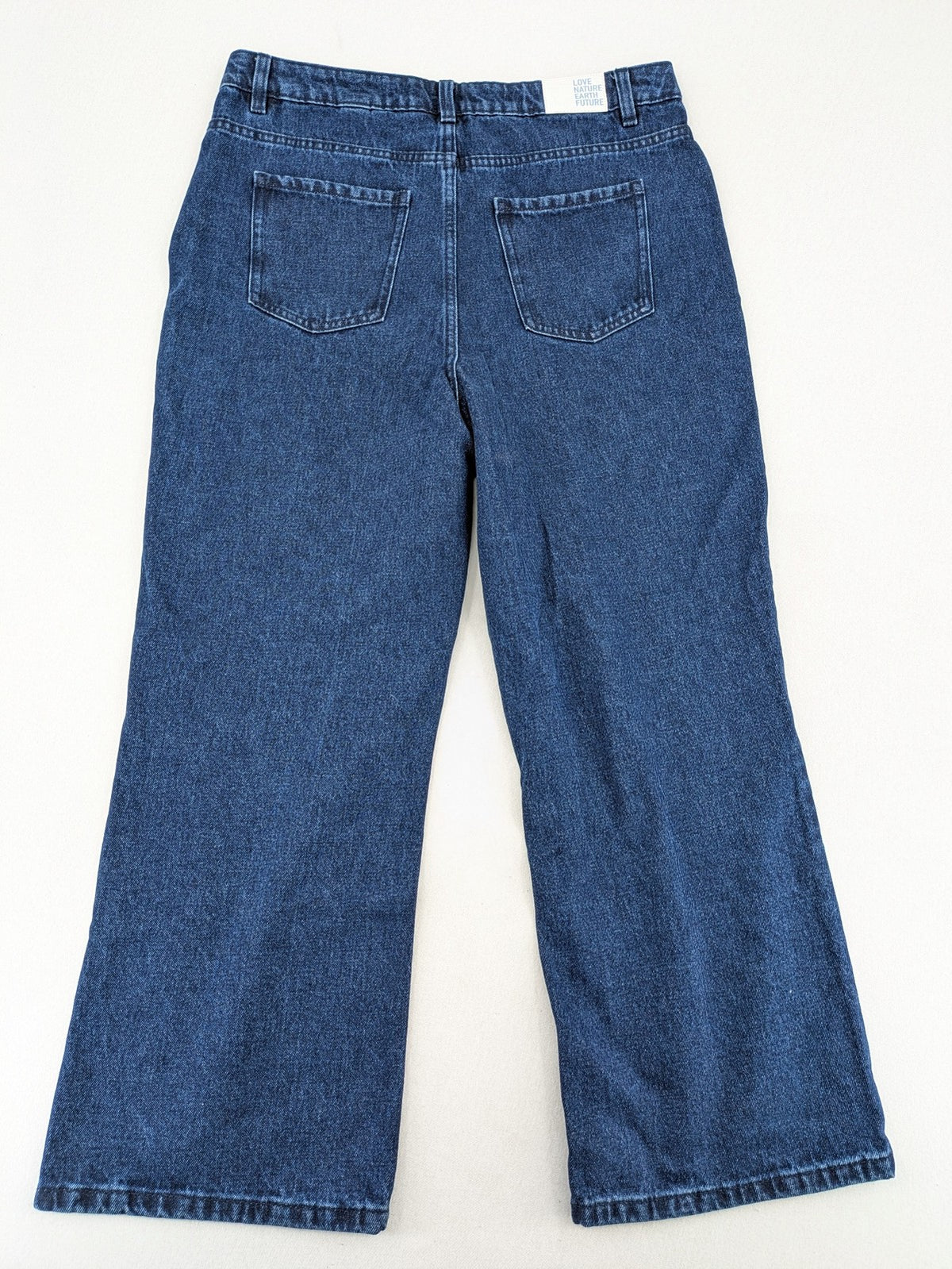 Tchibo blue straight jeans with five-pocket design and wide leg cut in durable cotton.