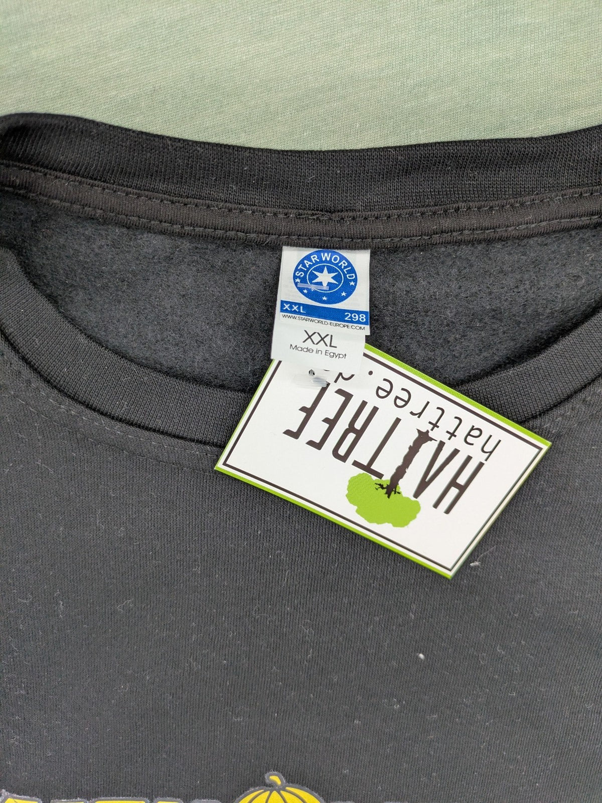 Helloween grey sweatshirt featuring bright yellow band logo, made from cotton blend.