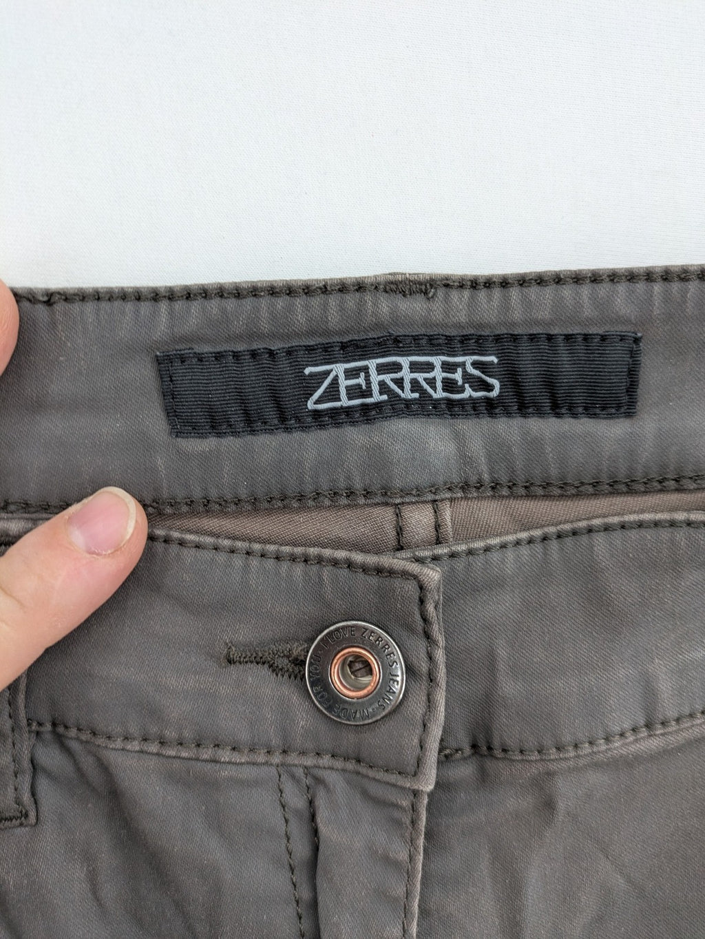 Zerres grey slim fit chino pants with ankle zippers and classic 5-pocket design.