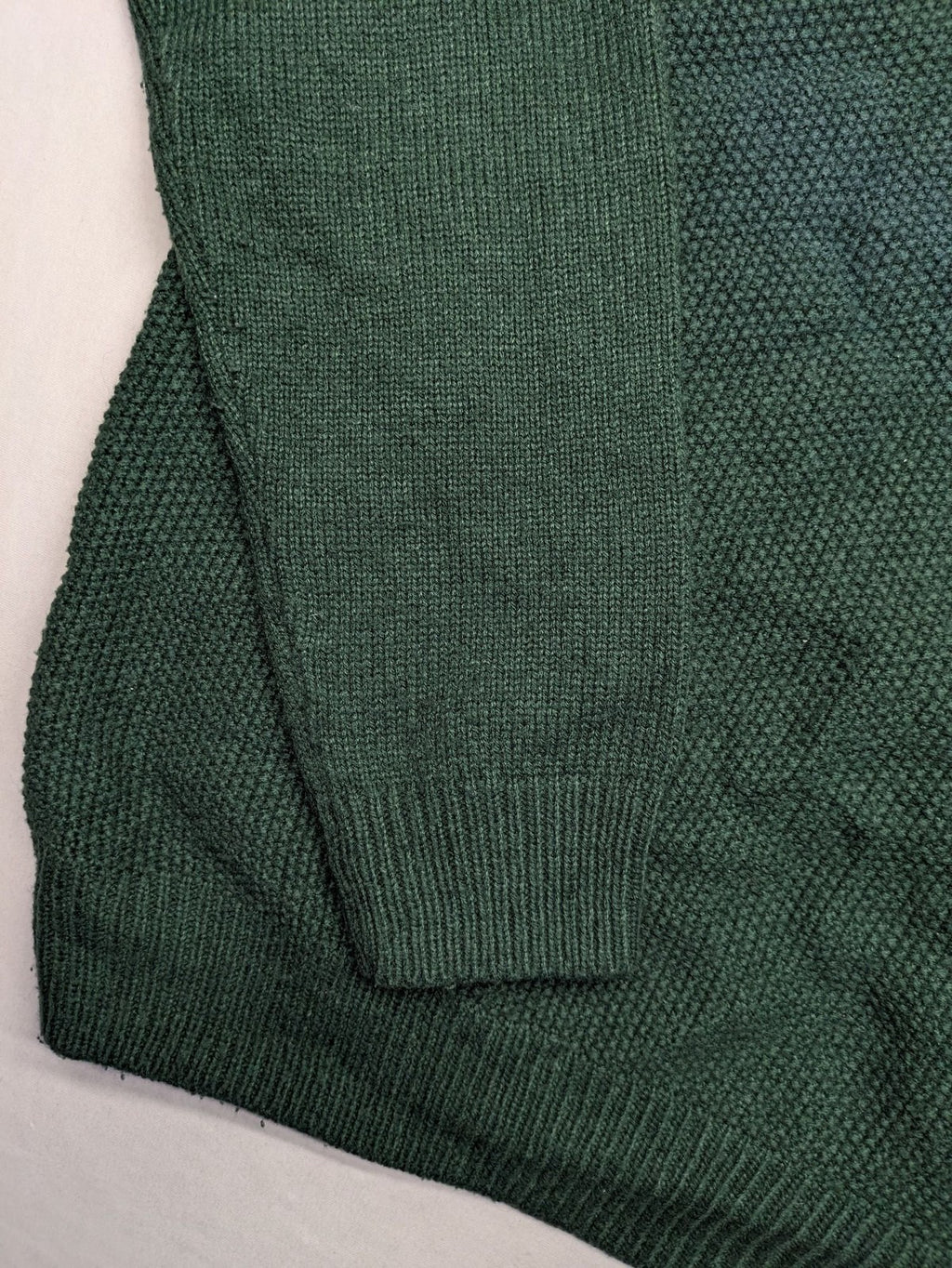 Broken Standard turtle neck jumper green waffle knit texture with classic round neckline.