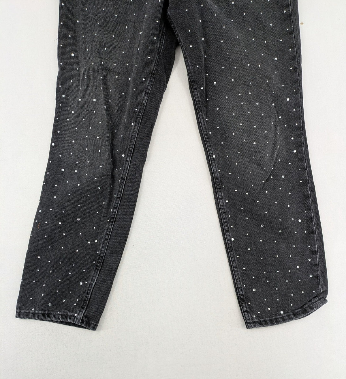 H&M Divided black straight jeans with allover rhinestone embellishments and classic five-pocket design.