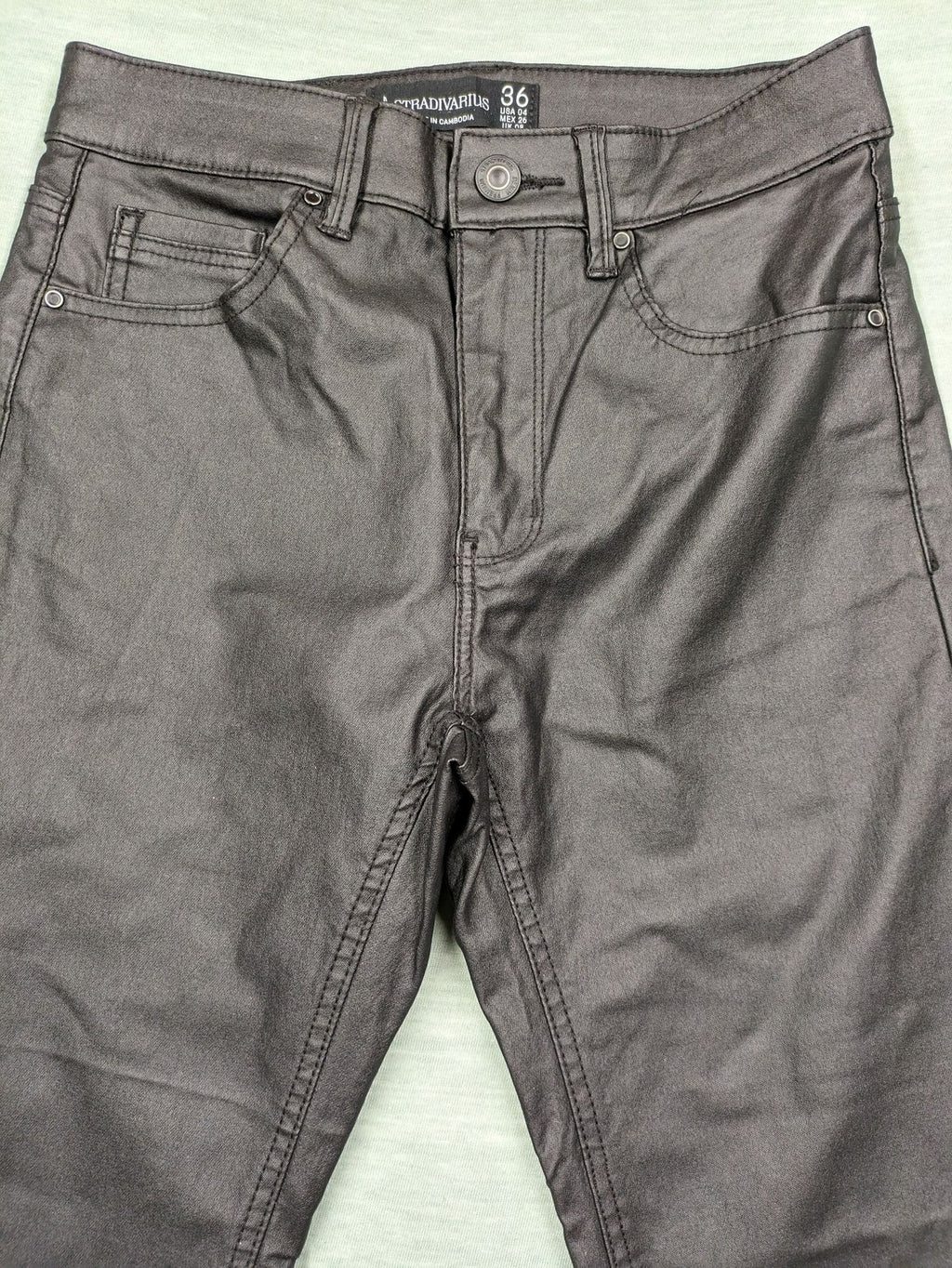 Stradivarius black coated skinny jeans faux leather finish stylish silhouette