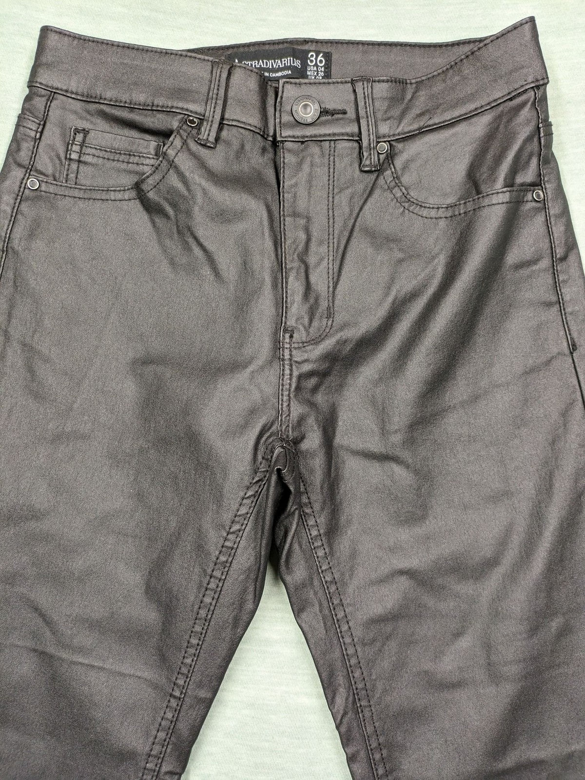Stradivarius black coated skinny jeans faux leather finish stylish silhouette