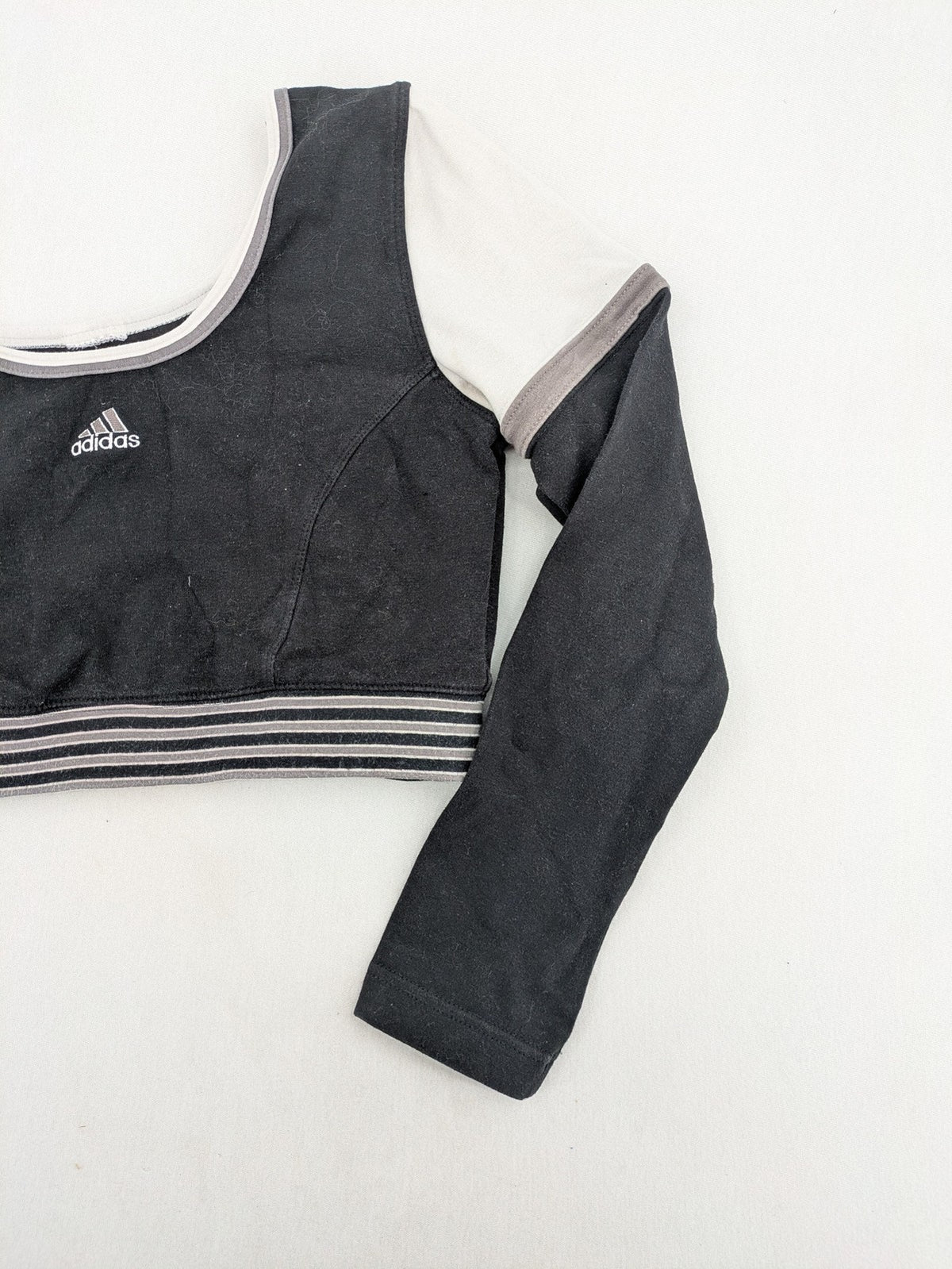 Adidas long sleeve crop top black grey white color-blocking with embroidered logo.