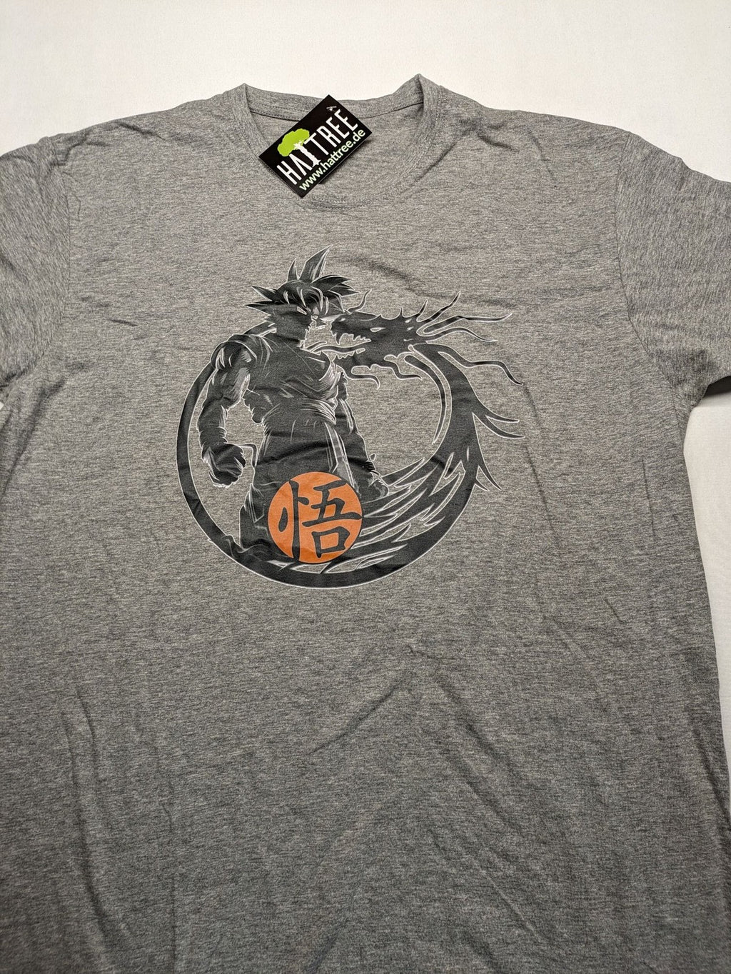 Dragon Ball Z grey t-shirt featuring Son Goku graphic print and "Go" Kanji symbol.