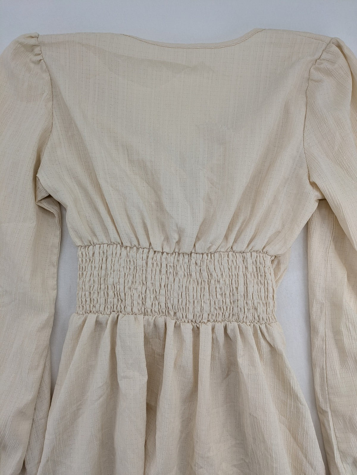 SHEIN beige bridal party dress with V-neck, ruffled bodice, and bishop sleeves.