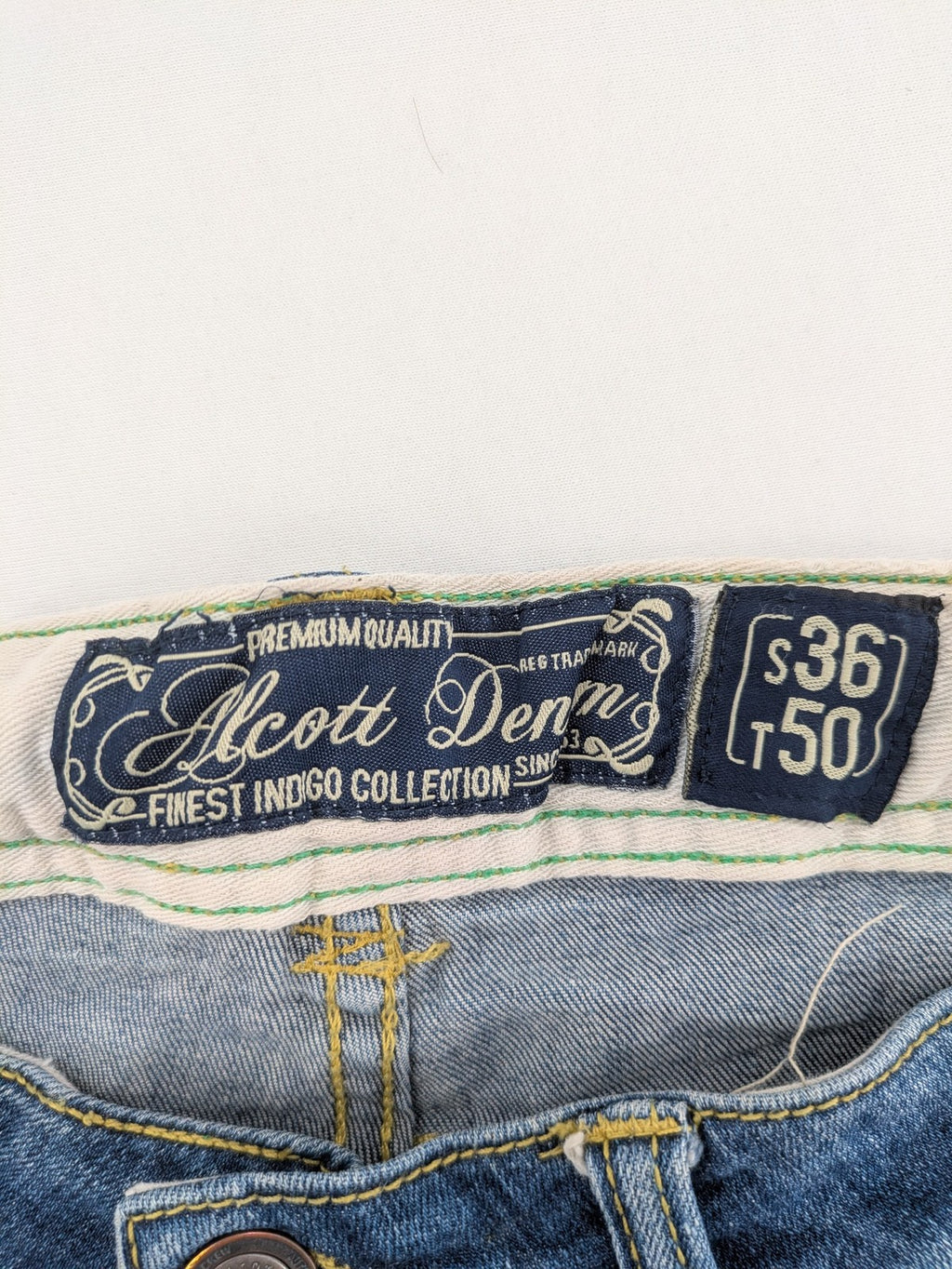 alcott skinny fit jeans blue distressed with button fly and strong wash details