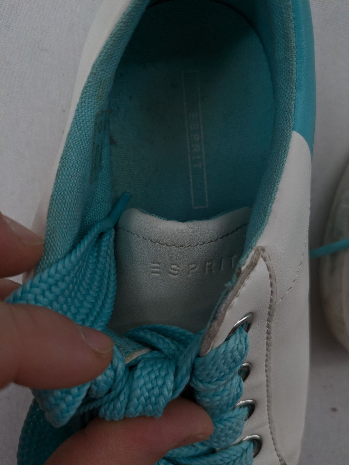 Esprit women's sneakers white with turquoise accents and wide laces.