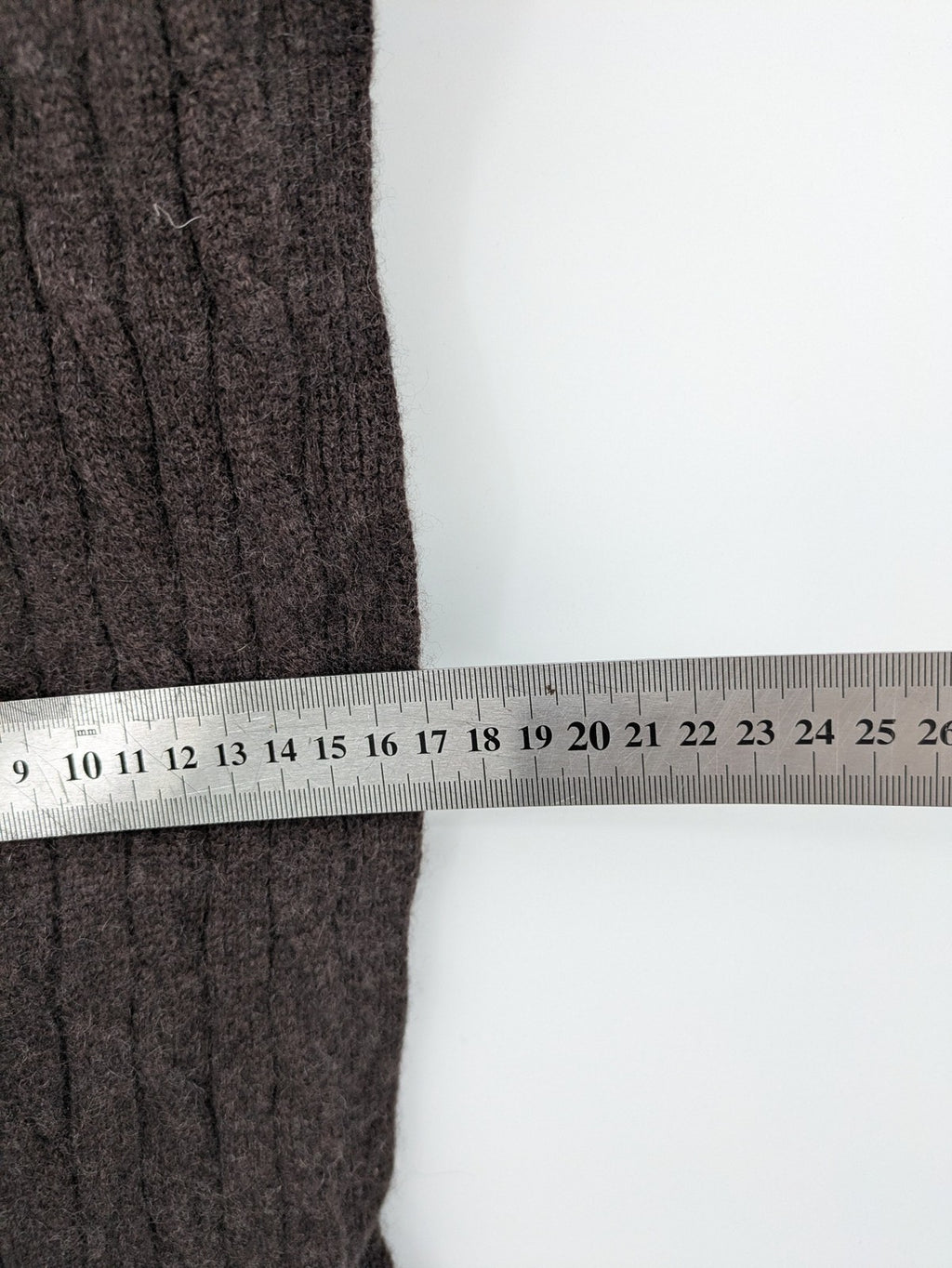 Marlon brown cashmere scarf with classic cable knit pattern for winter warmth.