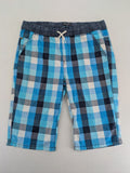 C&A blue checkered shorts with elastic waistband and side pockets, Skate Nation style.
