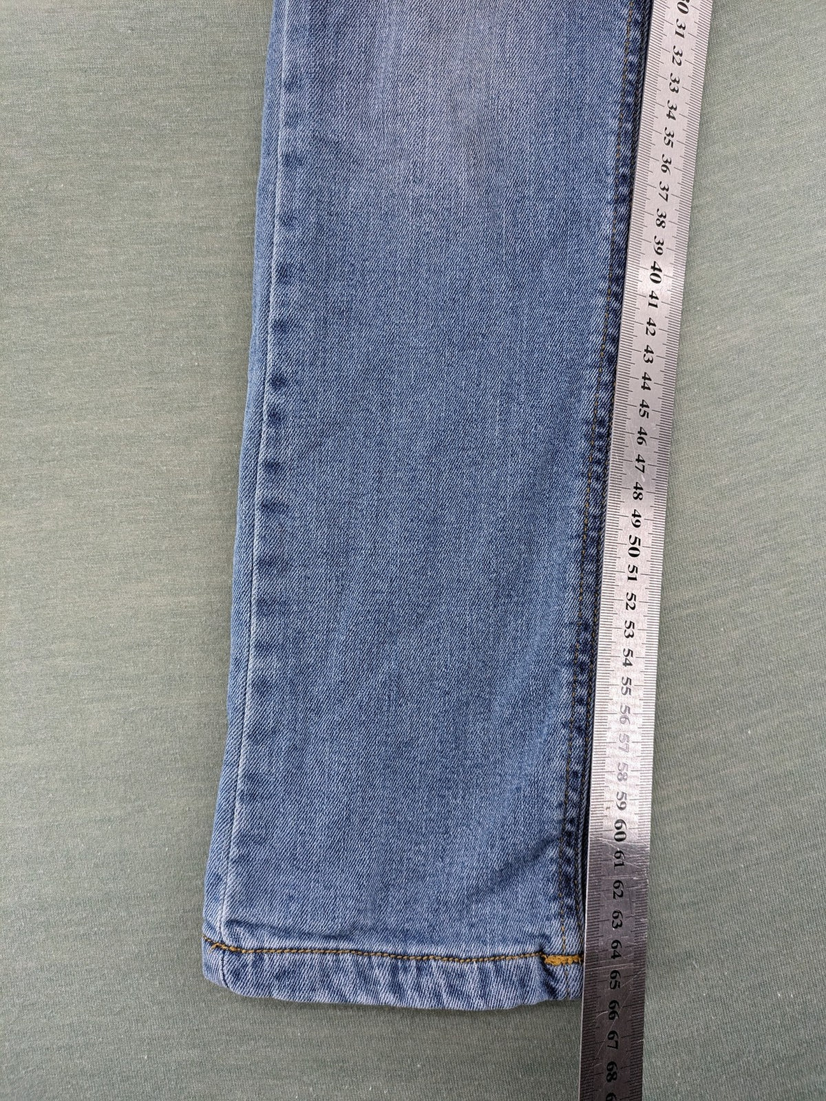 Alive blue straight jeans with classic cut, durable cotton-elastane blend, and button closure.