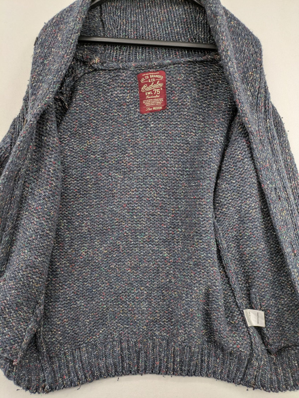 Catbalou multi turtle neck jumper with classic shawl collar and button closure.