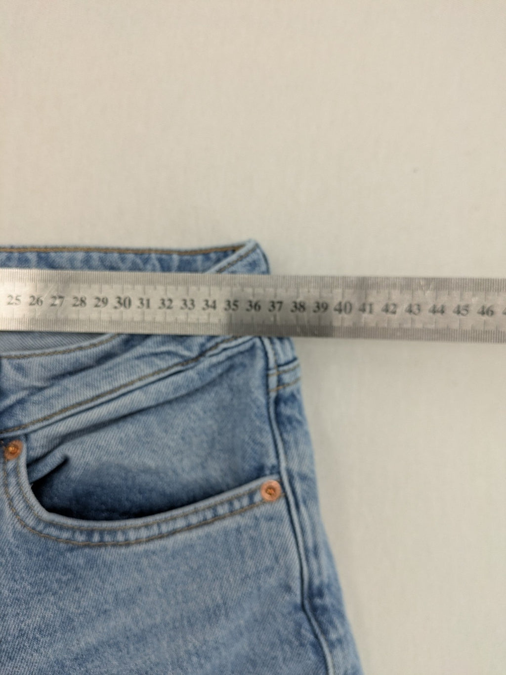 C&A blue mom jeans high waist with unique patchwork design and soft stretch denim.