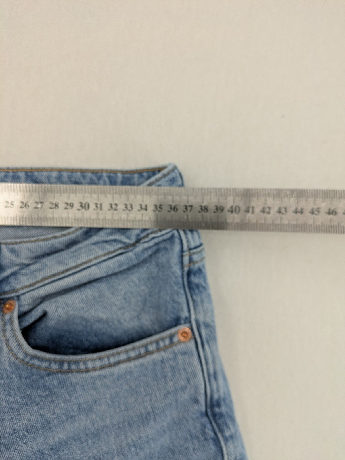 C&A blue mom jeans high waist with unique patchwork design and soft stretch denim.