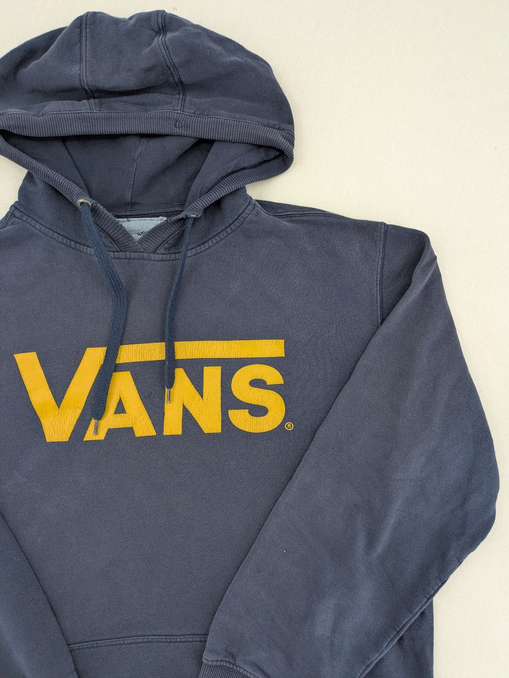 Vans zip-through hoodie navy blue with large yellow logo and kangaroo pocket.