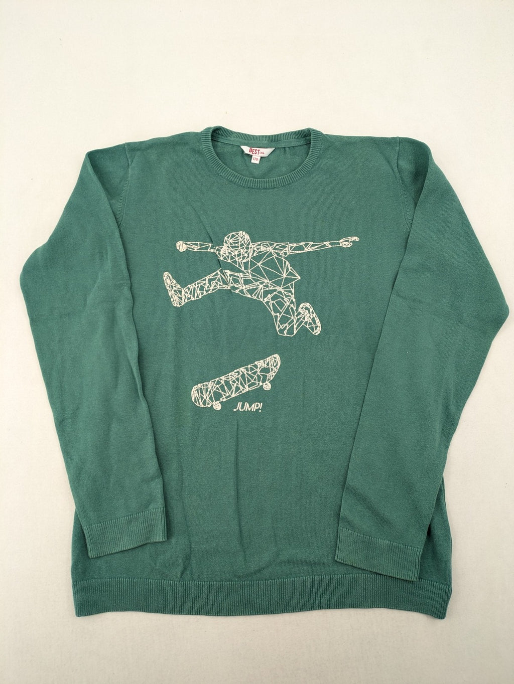 BESTies green turtle neck jumper with white skateboard graphic and ribbed cuffs.