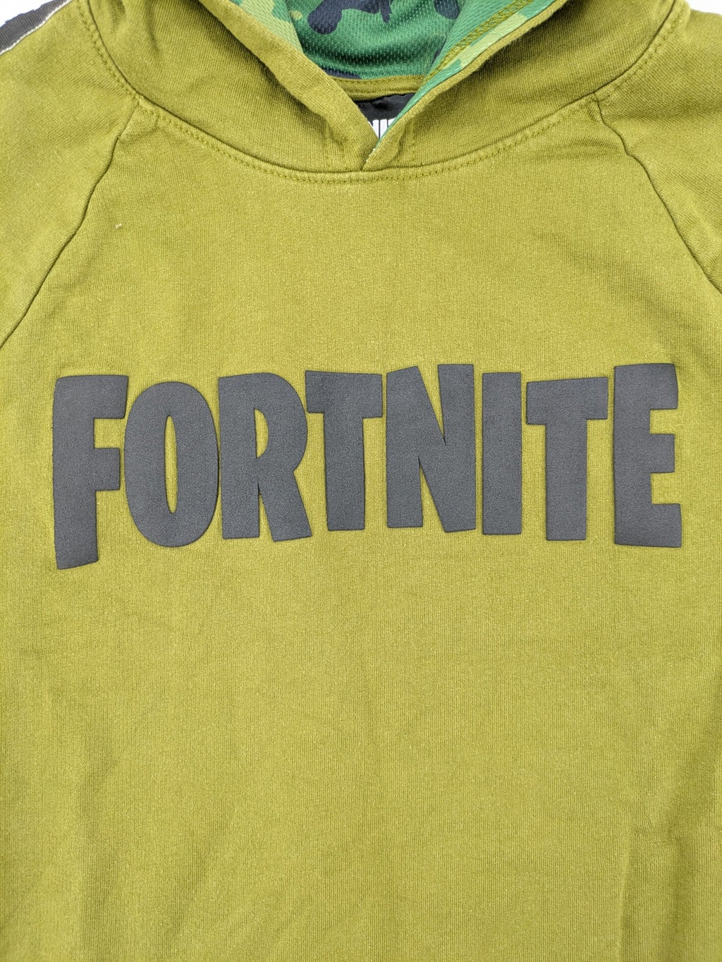 Fortnite green camo hoodie with black logo, contrasting hood, and logo taping on sleeves.