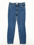 H&M blue skinny jeans with stretch denim and slim fit design.