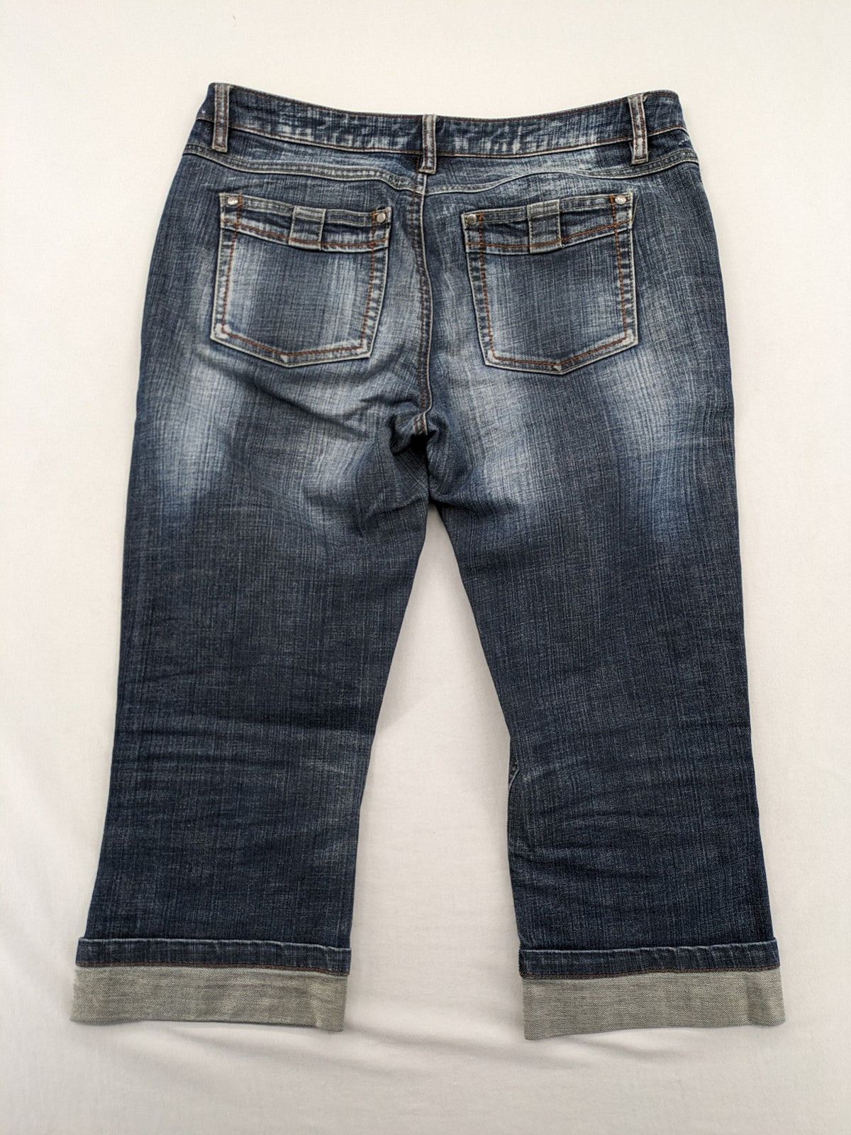 BLU blue straight jeans with washed effect, rolled hem, and five-pocket design.