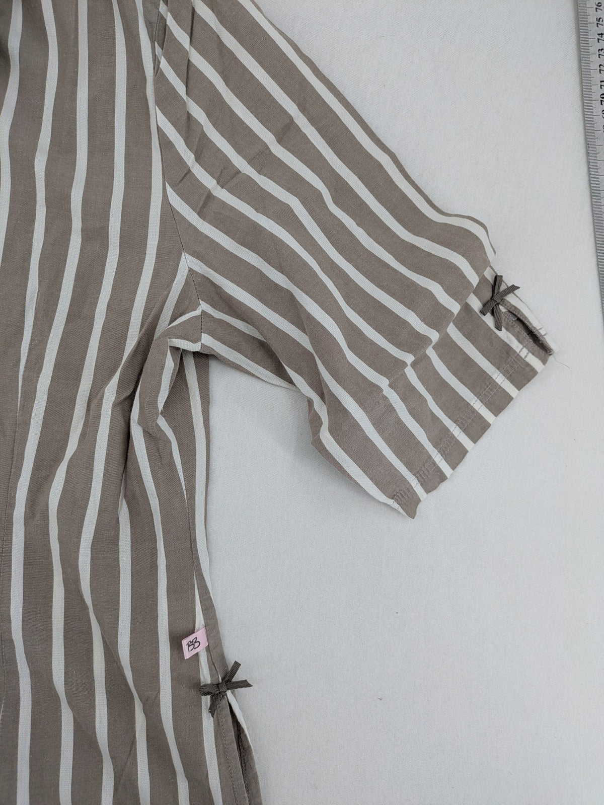 Body Sunday beige and white striped loungewear top with bow accents and button placket.