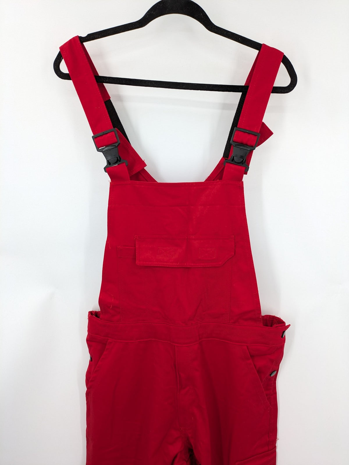 Stonekit red work overalls cotton with adjustable straps and multiple cargo pockets.