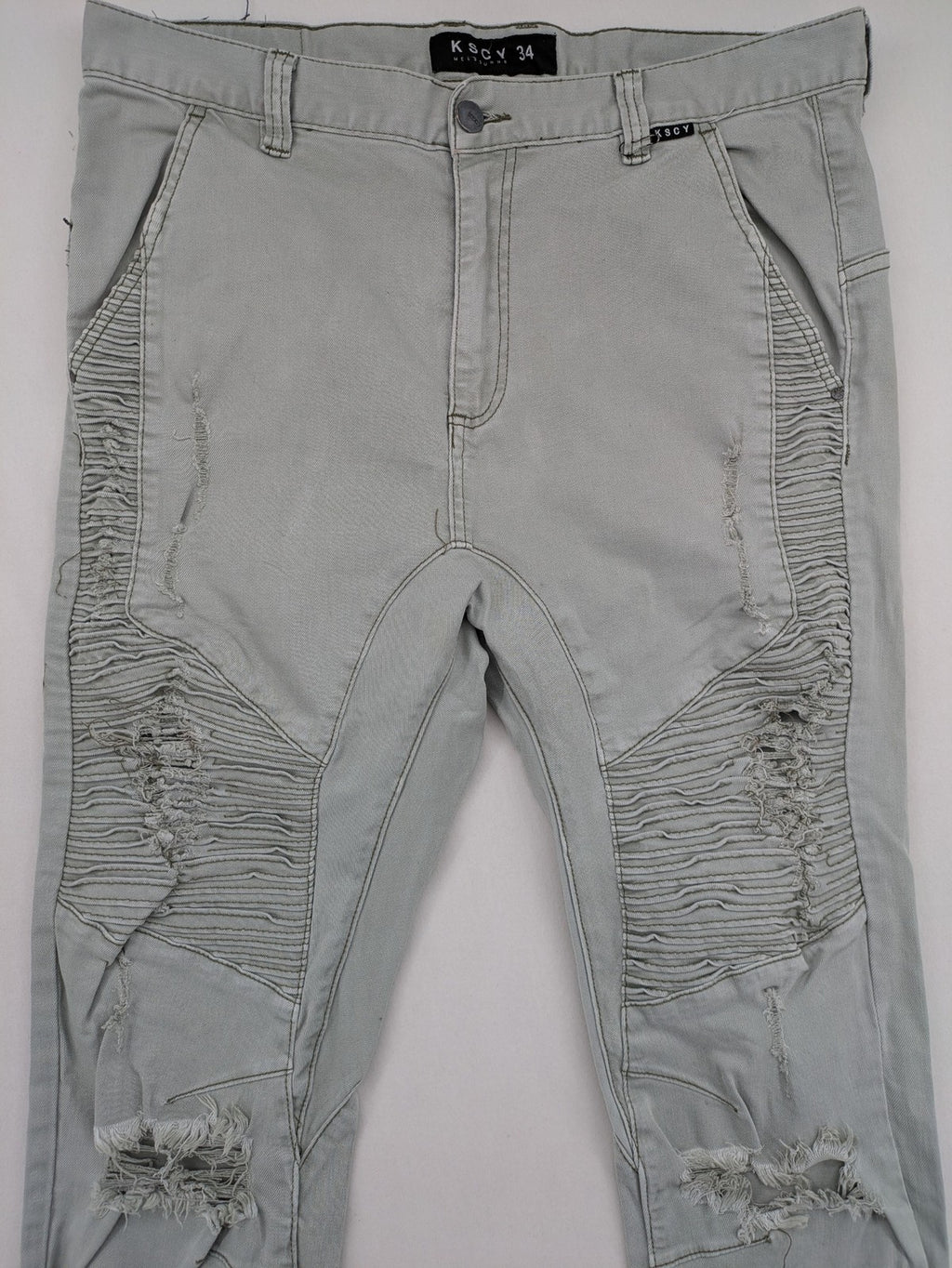 KSCY grey straight jeans with distressed details and ribbed biker inserts.