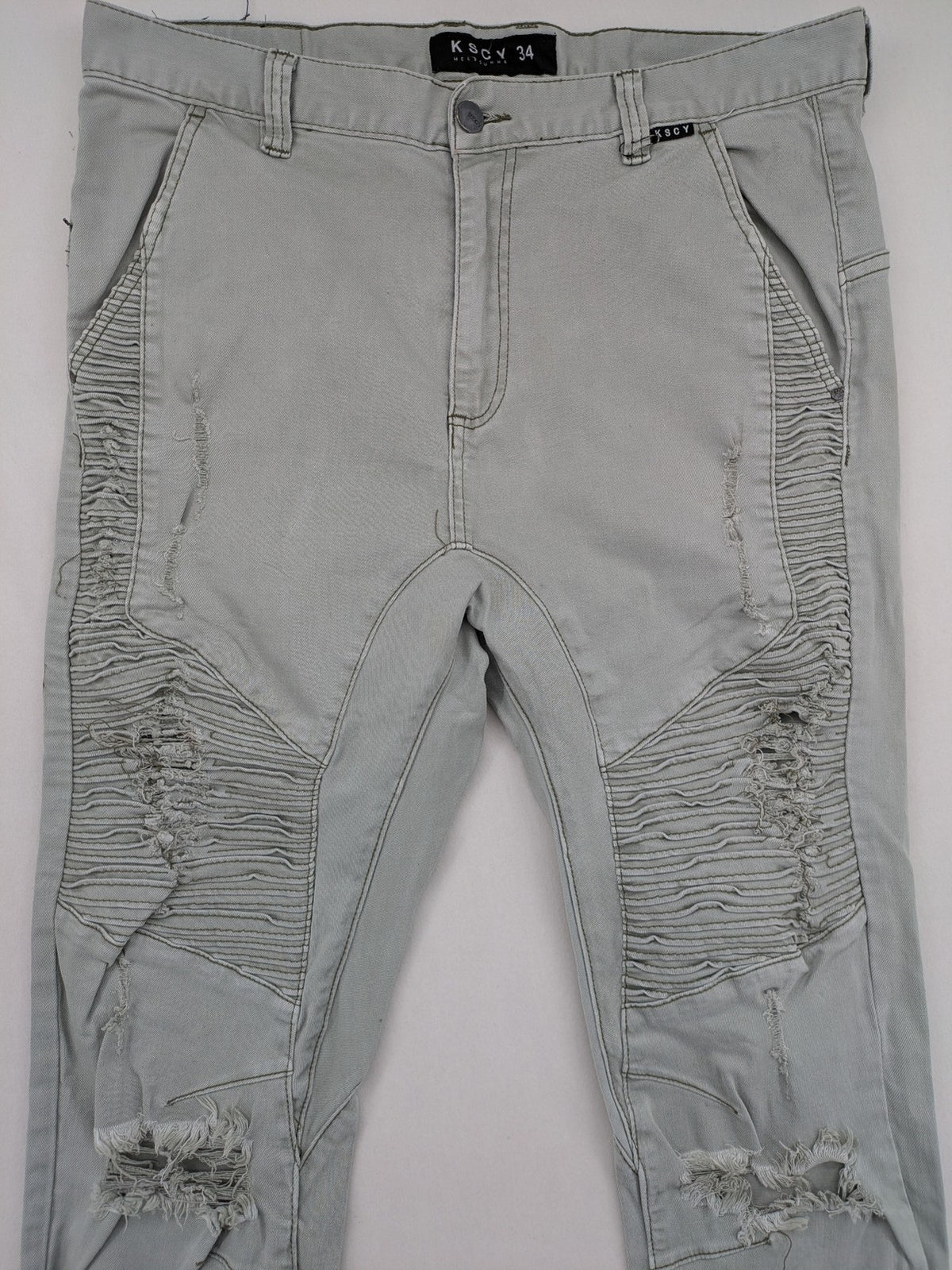 KSCY grey straight jeans with distressed details and ribbed biker inserts.