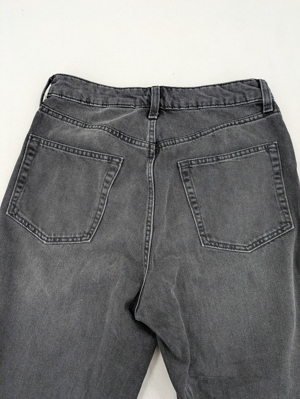 H&M Divided black straight jeans with allover rhinestone embellishments and classic five-pocket design.