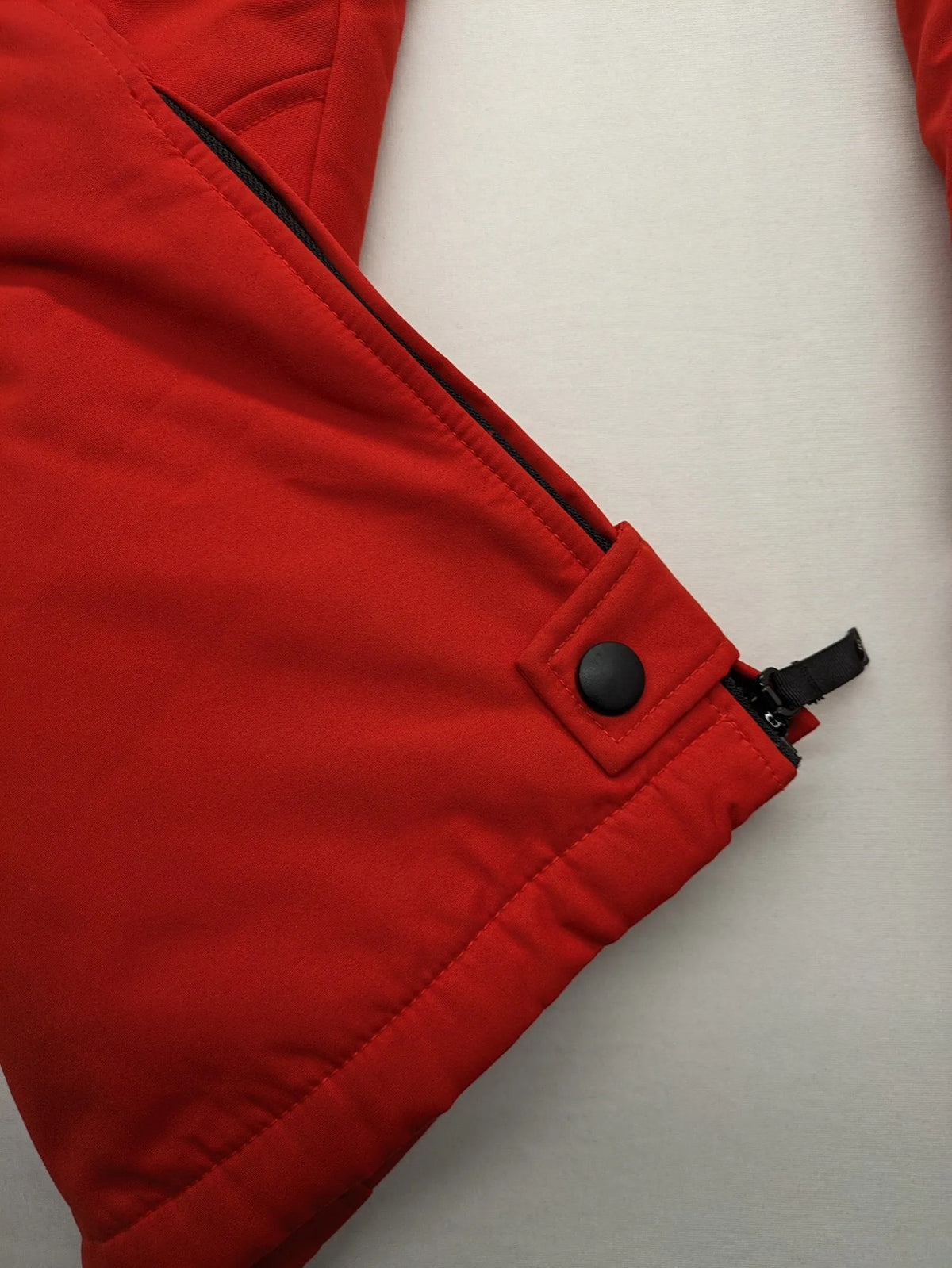 Rodeo red ski pants padded design adjustable belt multiple zip pockets