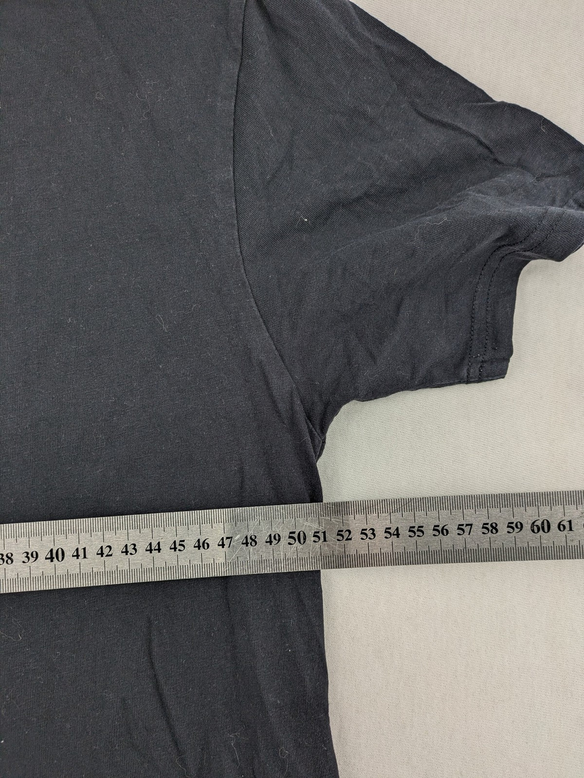 Carlo Colucci grey t-shirt with embroidered logo on chest and brand label details.