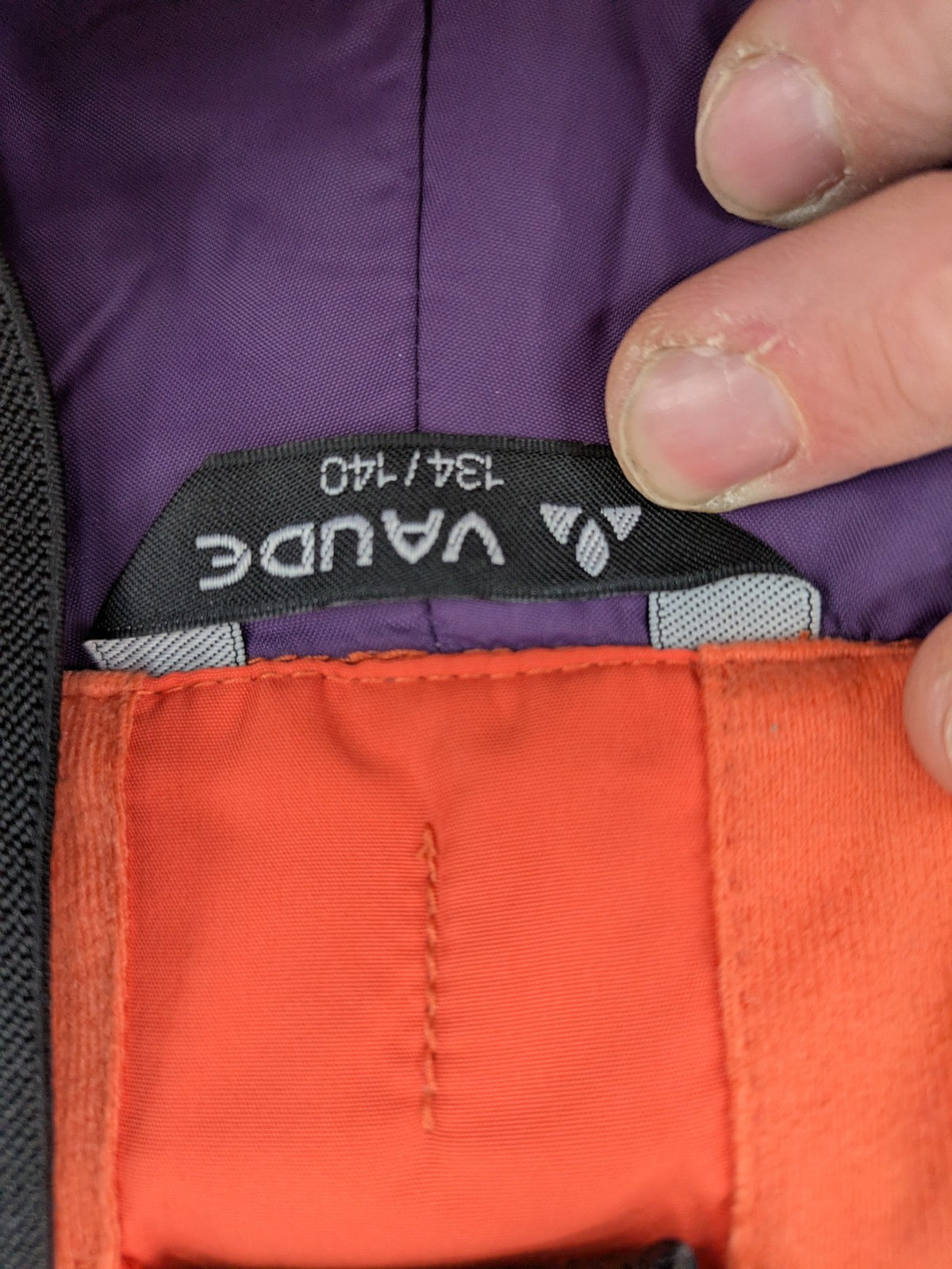 Vaude orange ski pants with logo, Primaloft insulation, and Ceplex Active membrane.