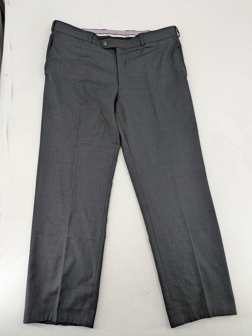 Desch grey suit pants with subtle pinstripe pattern and flat front design.